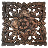 small carved wood plaque