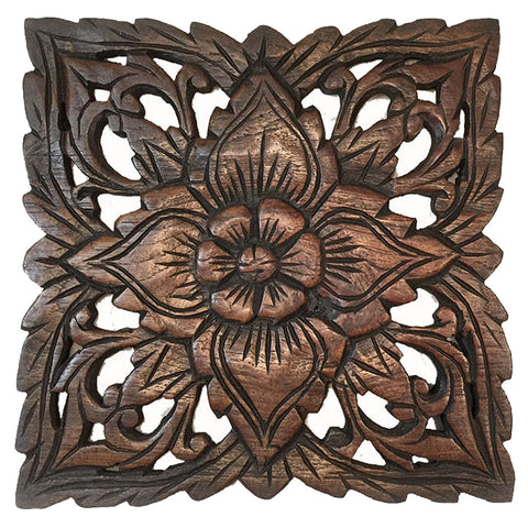 small carved wood plaque